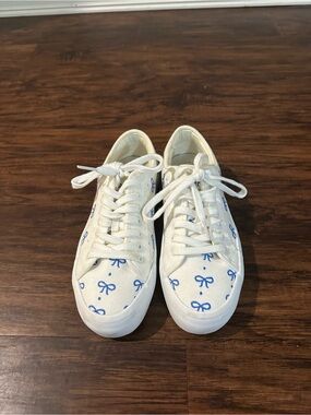White Canvas Lace-Up Sneakers with Blue Bow Print